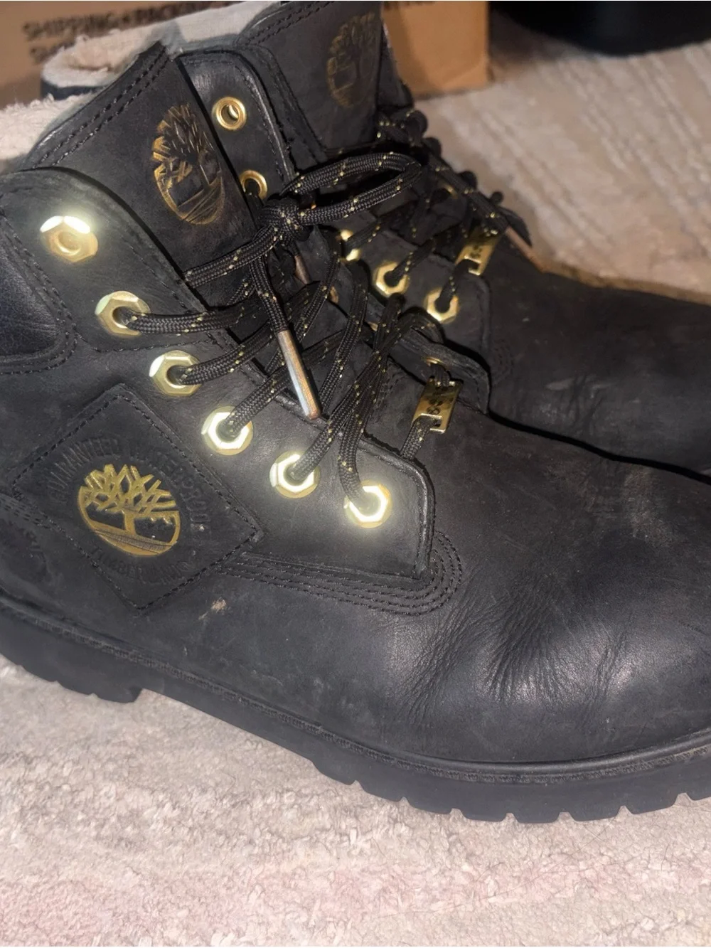 Timberland Black Leather Lace-Up Ankle Boots with Gold-Tone Accents